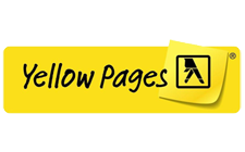Yellow Pages logo, featuring a yellow background with black text and a graphic of a person using a phone, symbolizing local business services and customer connections.